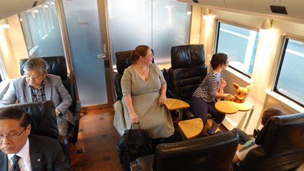 Green car seats on the Kamome Limited Express